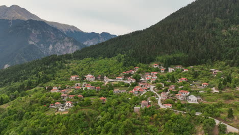 Aerial-drone-view-of-old-stone-houses-in-traditional-village-in-Greece