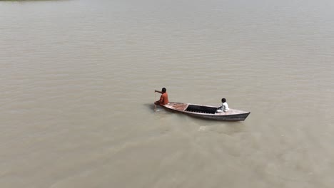 Canoeing-on-Tranquil-Botar-Lake,-Sanghar,-Pakistan.-Aerial