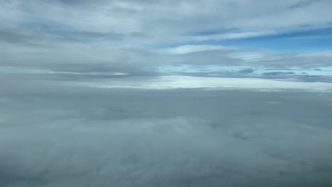 Immersive-flying-experience-across-a-sky-plenty-of-fluffy-clouds,-as-seen-by-the-pilots