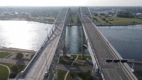 Aerial-view-of-empty-lanes-on-Blue-Water-Bridge,-Port-Huron-Michigan,-USA