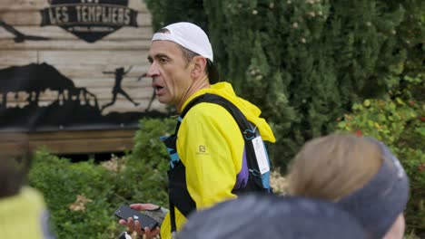 Slow-motion-shot-of-a-competitor-smiling-after-completing-Festival-Des-Templiers