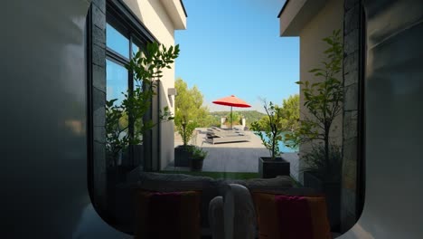 Slow-dolly-shot-showing-a-private-pool-with-sun-loungers-beside-in-a-villa