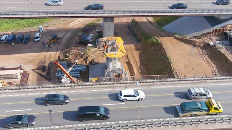 Construction-process-of-bridge-columns-in-Kauans-city-for-A1-highway,-aerial-view