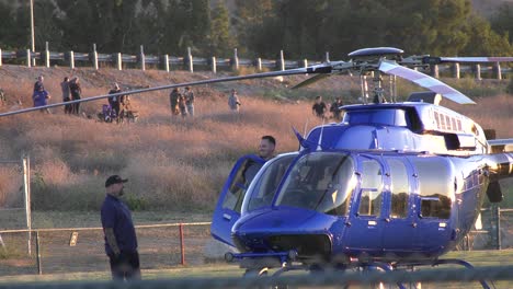 helicopter-on-ground-with-pilots-talking