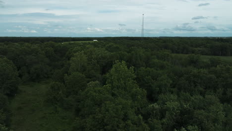 Rural-Missouri-aerial-flyover-shot-of-forest-natural-park-with-green-trees,summer