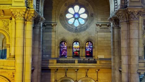 Panoramic-view-of-the-neo-baroque-and-neo-Byzantine-architecture-inside-the-Church-of-Los-Sacramentinos,-natural-light-entrances,-decorative-stained-glass-windows