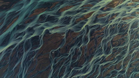 Aerial-Close-up-Detailed-Of-Kálfafell-River-Braids-Of-Iceland