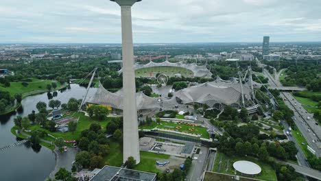 Vista-Aérea,-La-Imponente-Torre-Olímpica-Y-El-Parque-Olímpico-Al-Fondo