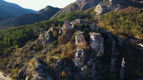 Rubik-Monastery-Church,-Exploring-the-11th-Century-Cultural-Monument-Amidst-the-Mountains-Albanian-Landscape