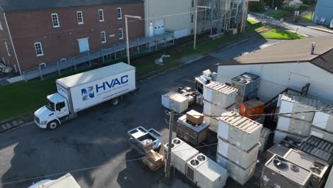 HVAC-truck-with-air-condition-units-at-retailer