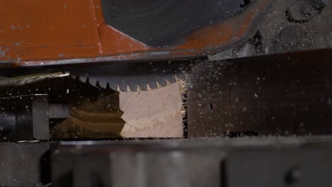 high-speed-shot-of-a-circular-saw-stopping-while-cutting-a-piece-of-wood