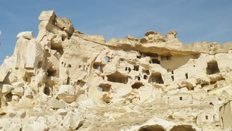 Charming-Turkish-ancient-rock-cave-houses-dominate-scenic-landscape