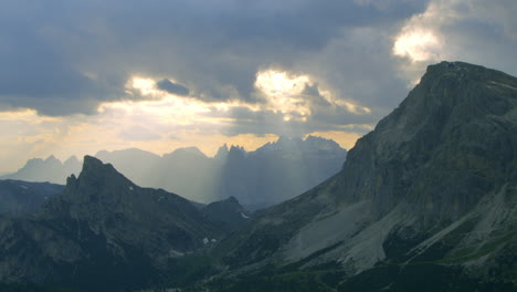 Breathtaking-Sunset-Golden-Hour-Sun-Rays-in-Italy-Dolomites-Mountains,-Aerial