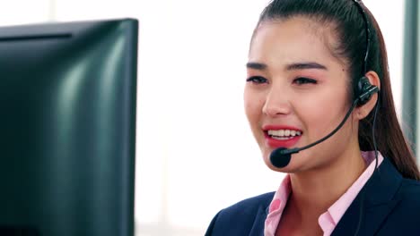 Business-people-wearing-headset-working-in-office