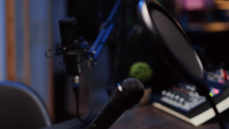 Zoom-out-shot-of-podcast-microphone-used-to-record-conversations-with-impeccable-sound-quality