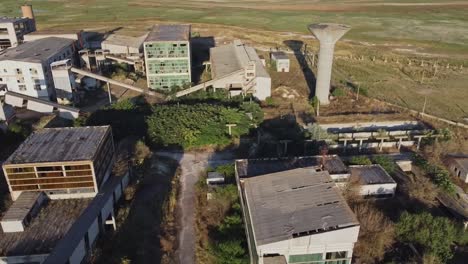 Drone-surveillance-of-abandoned-factory-area,-Romanian-ante-communism-buildings