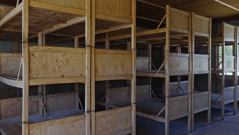 Prisoner-wooden-bunk-beds-inside-Dachau-Concentration-Camp-Memorial-Site