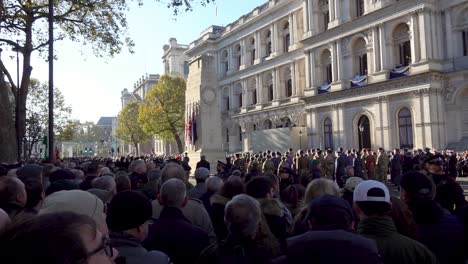 People-gather-at-the-Cenotaph-on-Armistice-Day-in-London,-UK
