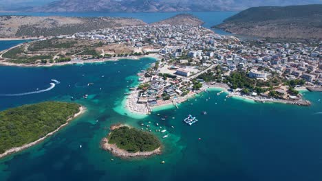 Ksamil-Islands-Beckon-with-Turquoise-Waters,-White-Sand,-and-Coastal-Resorts,-Perfect-Summer-Vacation-Haven