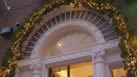 Christmas-decoration-on-entrance-of-Iveagh-hotel-Dublin,-Ireland