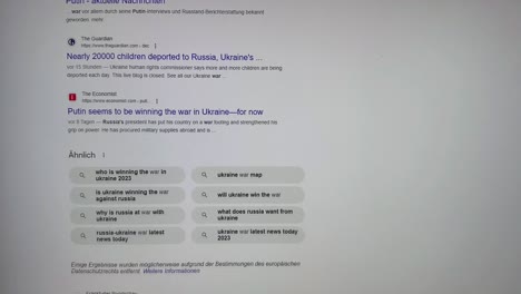 Google-News-of-Putin-War-against-Ukraine-in-2023,-Scrolling-on-computer-screen