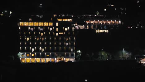 Sorrento-Hotel's-Glowing-Facade-at-Night,-Italy