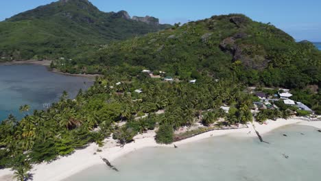 Aerial:-Peaceful-south-seas-vibe,-tropical-isle-Maupiti-idyllic-beach