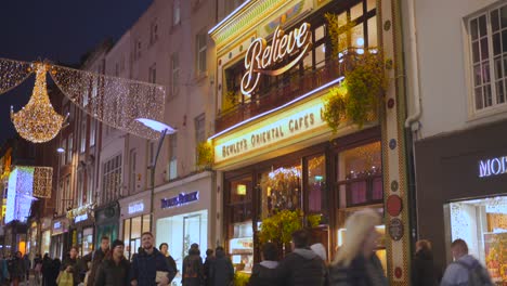 Tilt-shot-of-Bewleys-Oriental-cafe-during-Christmas-on-shopping-street-in-Dublin,-Ireland