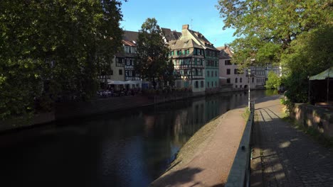 Petite-France-is-the-Strasbourg's-lively-tourist-hub,-known-for-cobblestone-streets,-canals,-and-well-preserved-half-timbered-homes