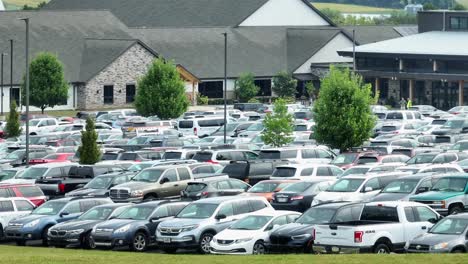 Cars-parked-in-full-parking-lot-at-modern-mega-church-in-USA