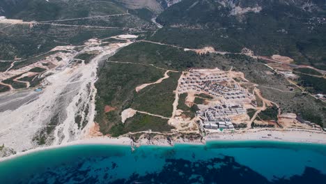 Seaside-Tranquility-Marred-by-Resort-Construction,-Unveiling-the-Environmental-Impact-on-the-Ionian-Sea-Shore-in-Albania