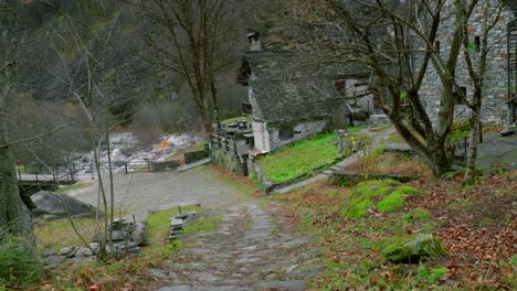 Approaching-video-shot-of-the-stone-houses-in-village-of-Cavergno,-situated-in-the-district-of-Vallemaggia,-canton-of-Ticino-in-Switzerland