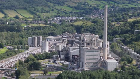 Hope-cement-works-aerial-view-across-industrial-factory-chimney-in-idyllic-Derbyshire-Peak-district