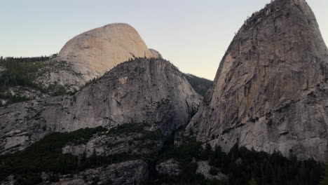 Half-dome-mountain-in-Yosemite-National-Park,-establishing-reveal-shot