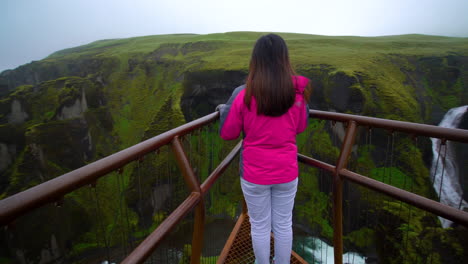 Woman-traveller-at-Fjadrargljufur-in-Iceland.