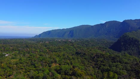 beautiful-aerial-view-with-drone-of-flying-over-rainy-forest-in-the-jungle-of-Ixhuatlan-del-café,-Veracruz,-Mexico