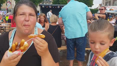 Mother-and-Son-Eating-Churros-Delicious-Pastry-in-Landskrona-Sweden