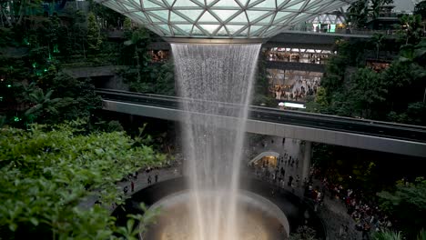 High-angle-wide-shot-of-indoor-waterfall-at-Jewel-Changi-airport-in-Singapore