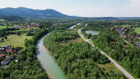 Panoramic-aerial-view-of-Lenggries-town-along-the-Isar-River,-German-town-scenic-landscape,-Bavaria,-Germany