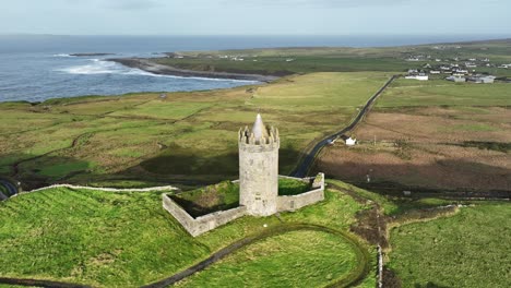 Drone-Doolin-Castle-with-the-road-to-Doolin-Village-and-ferry-to-the-Aran-Islands-in-winter