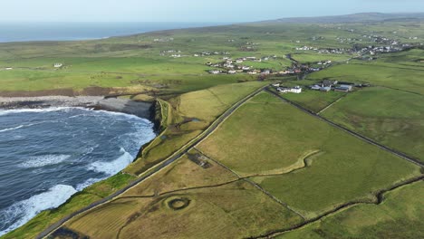 Static-drone-West-of-Ireland-road-to-Doolin-archeology-foaming-seas-and-Doolin-village-on-a-mild-November-morning