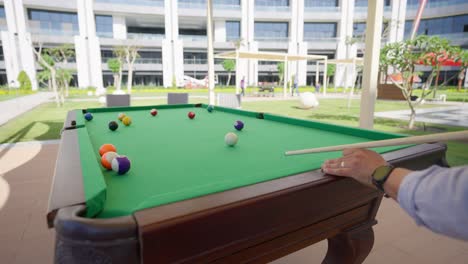 billiard-competition-between-Young-men-in-the-hall-insert-shot,-wide-shot