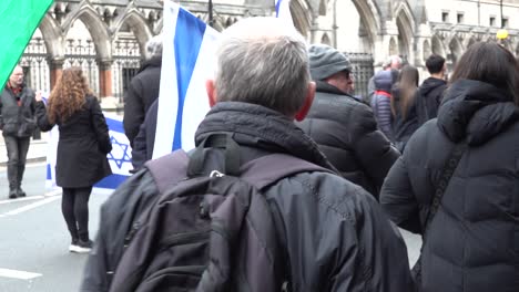 Israeli-flag-at-protest-in-London,-UK.-26.11.23