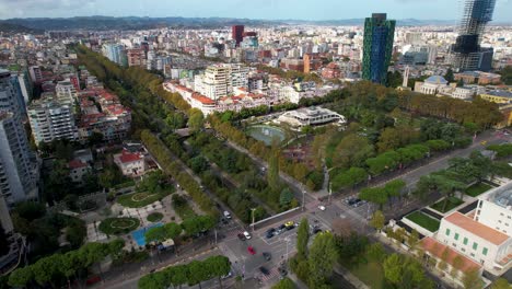 Tirana's-Central-Park-Harmonizes-with-Modern-Architectural-Gems,-Accentuated-by-the-Colorful-Presence-of-the-Iconic-Pyramid