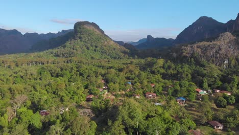 Mountain-countryside-in-Northern-Laos-surrounded-by-mountains-on-a-sunny-morning-in-Ban-That-Hium-Viangthong