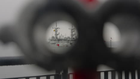 Observing-navy-style-ships-through-a-pair-of-playground-binoculars