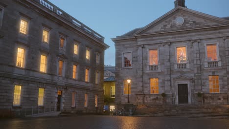 Panning-shot-of-Trinity-College-and-University-at-Christmas-in-Dublin,-Ireland