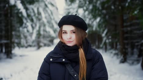 Young-beautiful-woman-smiling-despite-the-cold