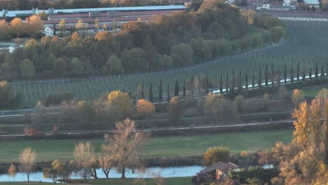 Aerial-Forward-Zoomed-Drone-Shot-of-Veneto-countryside-at-Golden-Hour---Borghetto-sul-Mincio