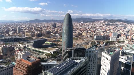 Aerial-view-of-Barcelona-City-Skyline,-Agbar-Tower,-Spain